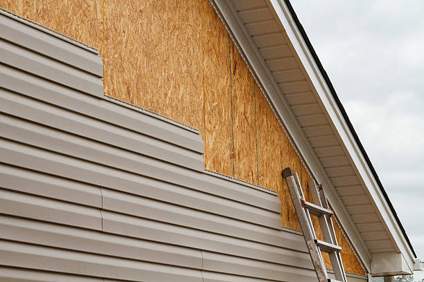 Professional Emergency Siding Repair technician working in Nesconset, NY